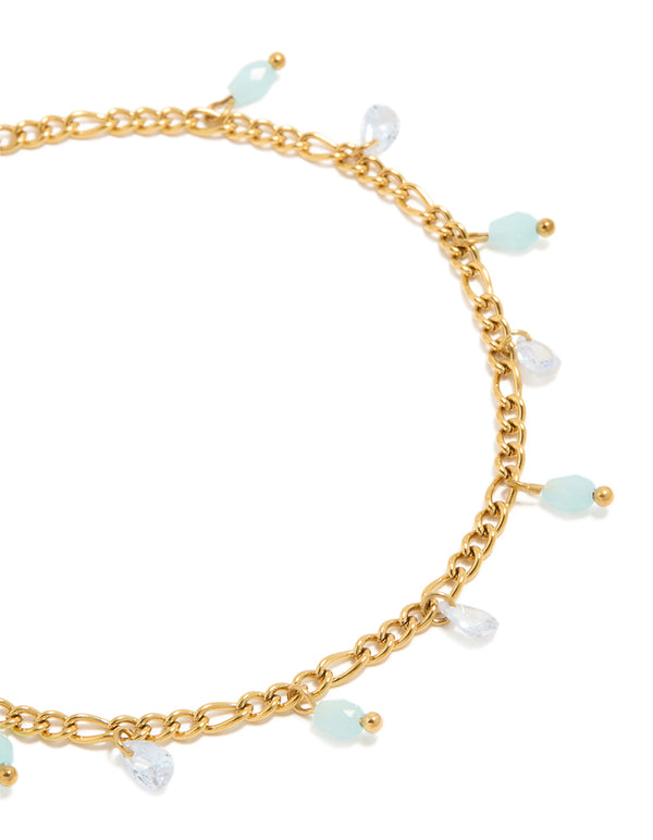 Showcasing a waterproof gold plated stainless steel anklet with aqua beaded and cubic zirconia droplet charms close up view