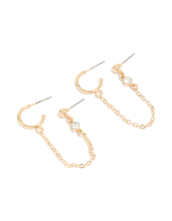Showcasing gold huggie and chain stud earrings featuring stud and huggie closure front view