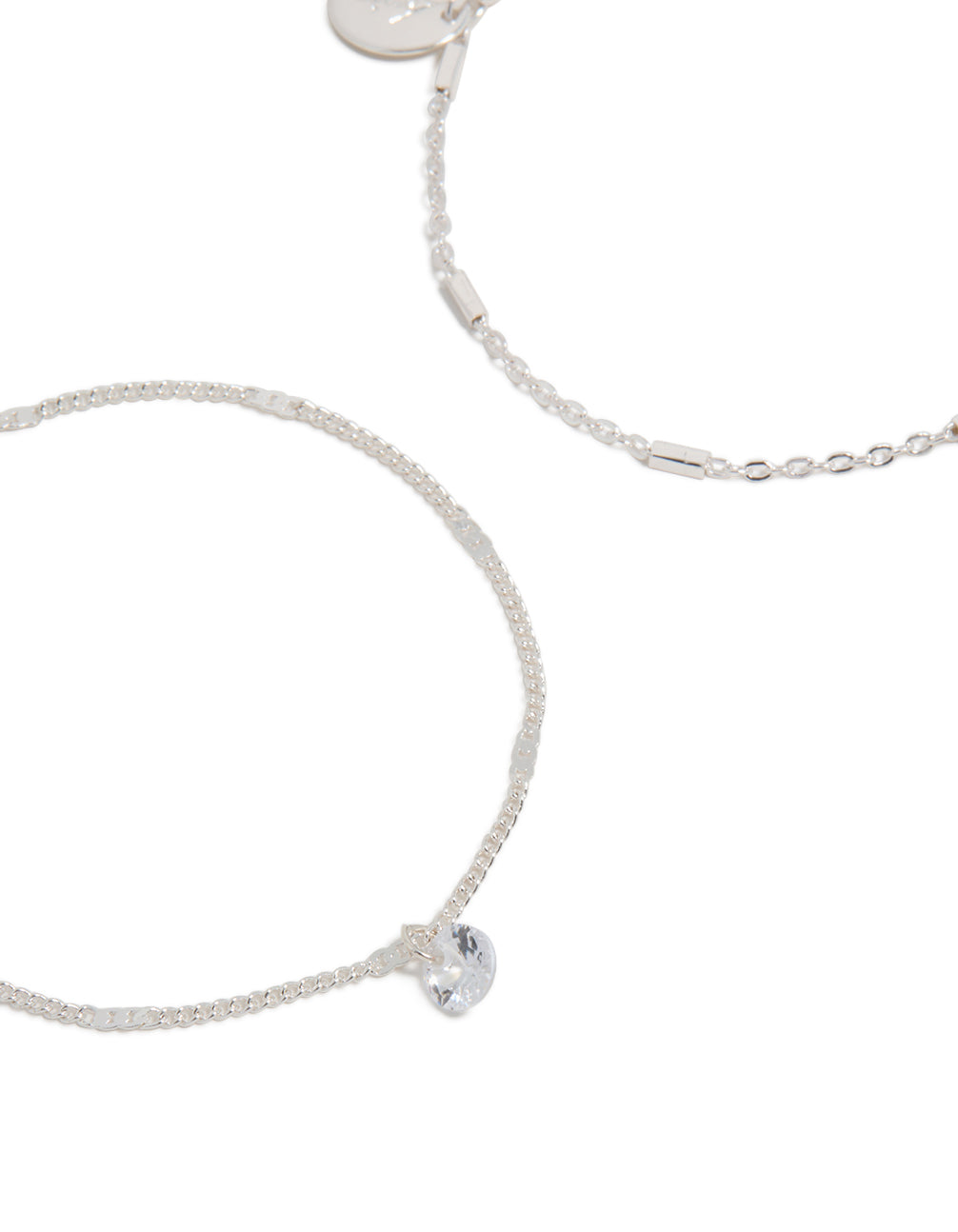 Crafted from silver cubic zirconia drop and chain bracelets in 2-pack close up view
