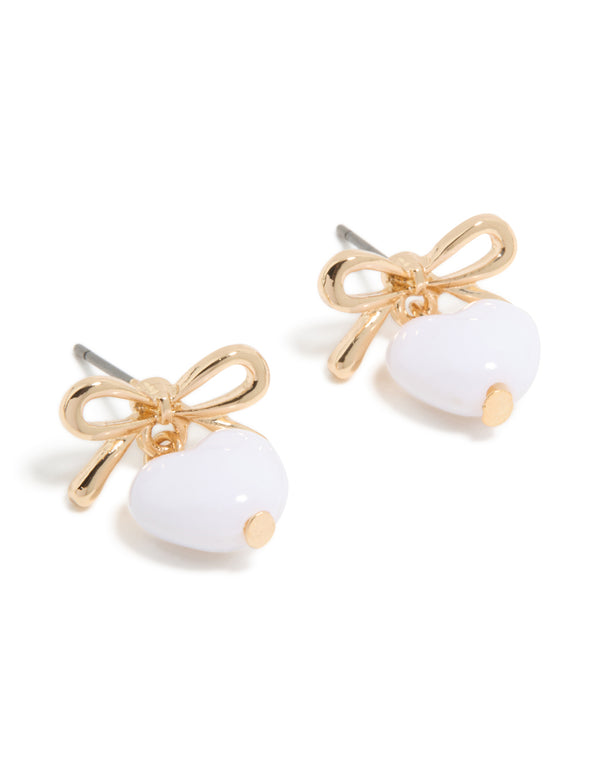 Featuring gold bow and white bubble heart drop earrings front view