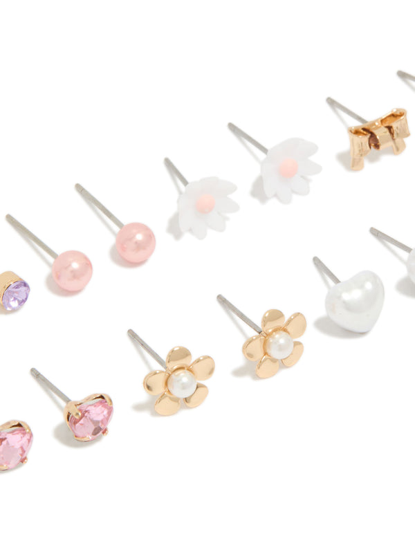 Crafted with gold diamante earrings 8-pack featuring butterfly, bow, floral, heart and pearl stud closure in pink white lavender close up view