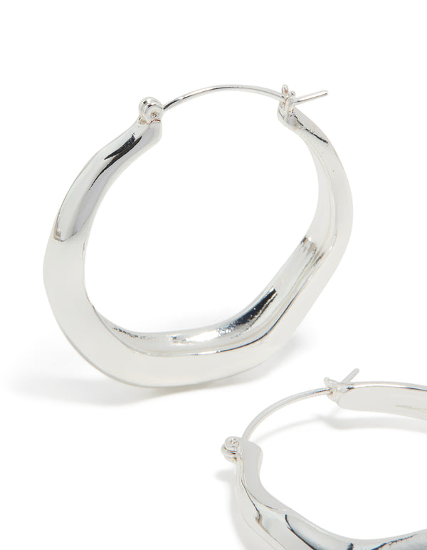Designed with silver plated large hoop earrings featuring pendant closure post detail view