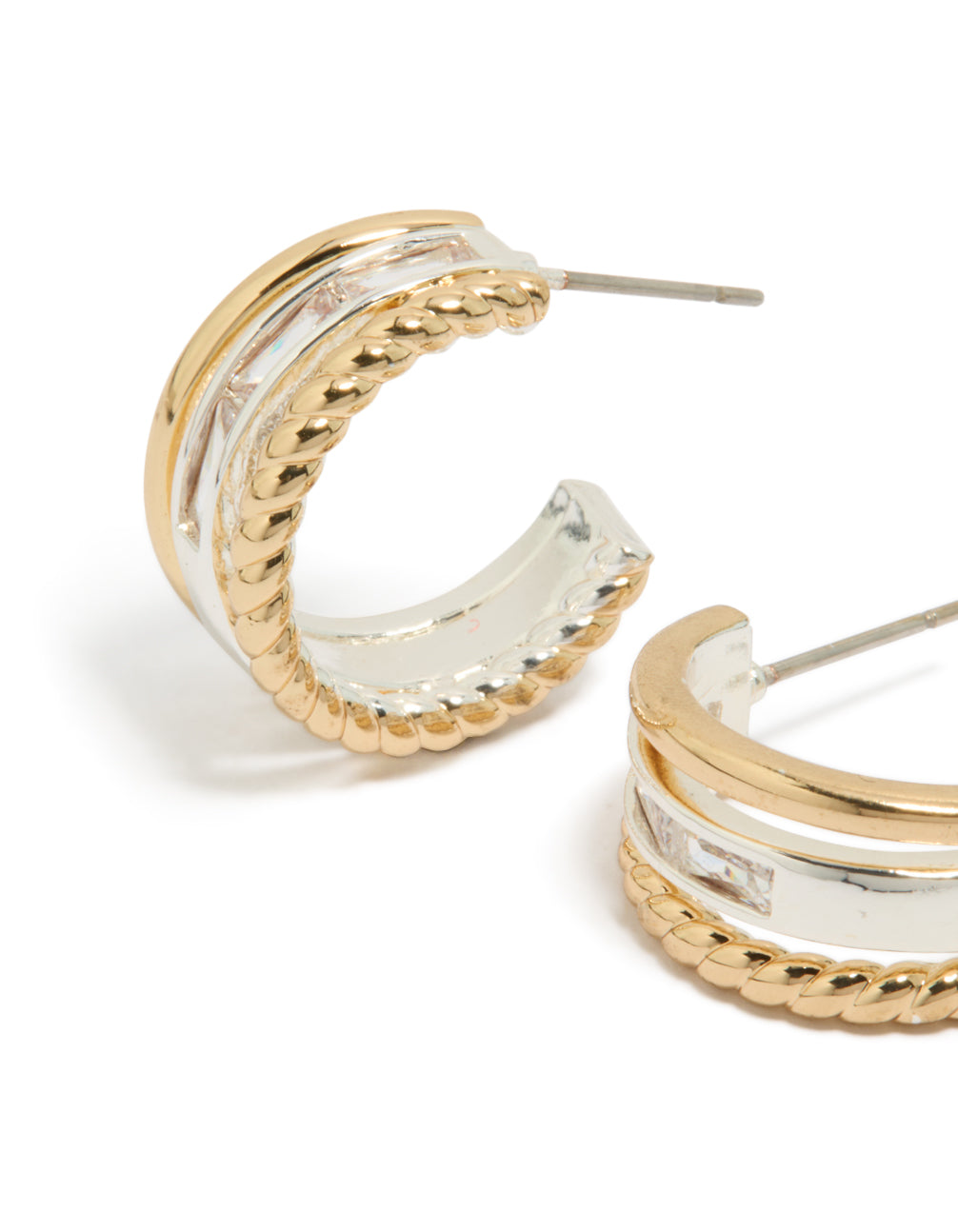Displaying mixed metal plated diamante triple layered small hoop earrings in gold and silver close up view