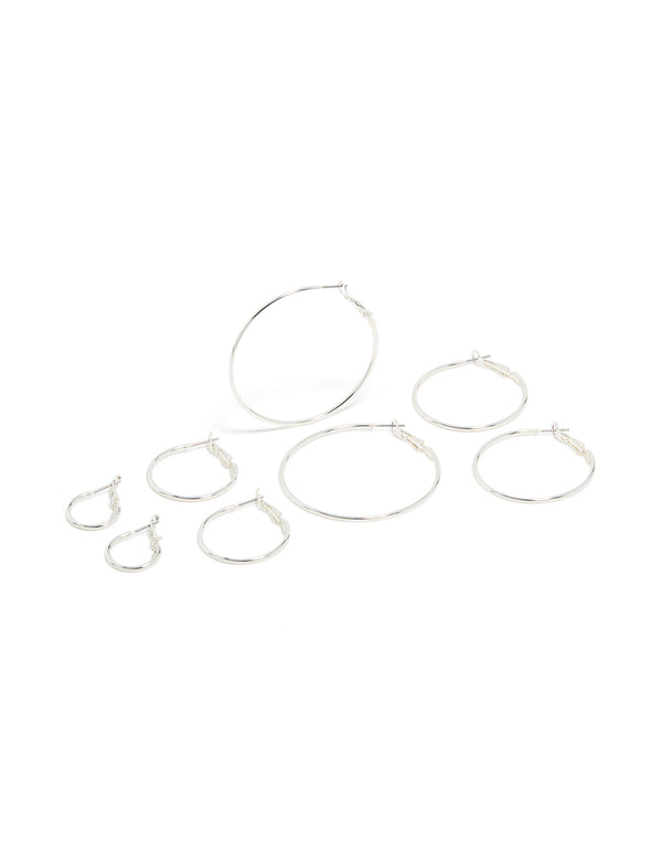 Crafted from silver plated material, these fine thin hoop earrings come in a 4-pack with closure featuring hoop design front view