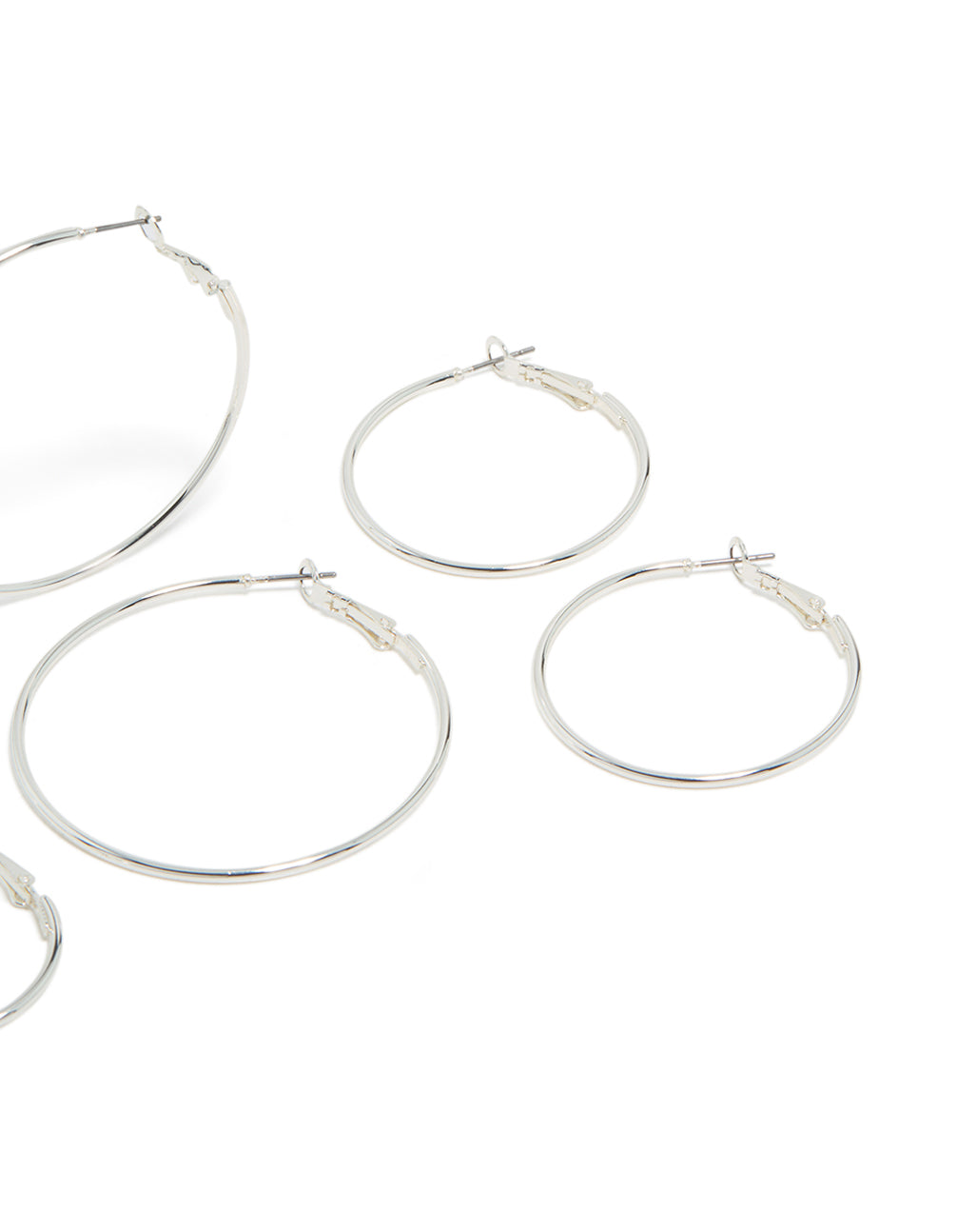 Designed with silver plated material, these fine thin hoop earrings in a 4-pack showcase closure mechanisms post detail view