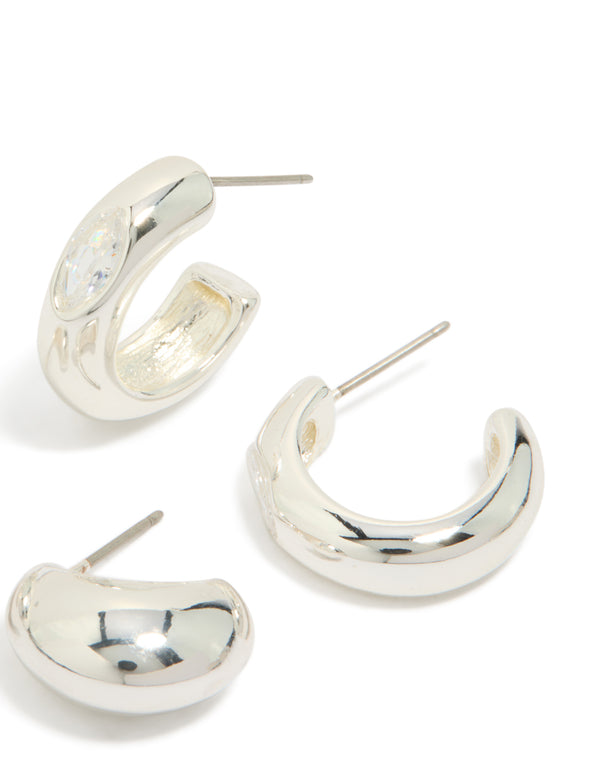 Highlighting silver plated cubic zirconia bezel and chubby open hoop earrings in a 2-pack post detail view
