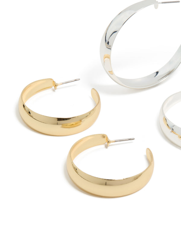 Featuring mixed metal plated thick and skinny hoop earrings in a 2-pack with gold and silver tones, chunky styling and hoop closure close up view