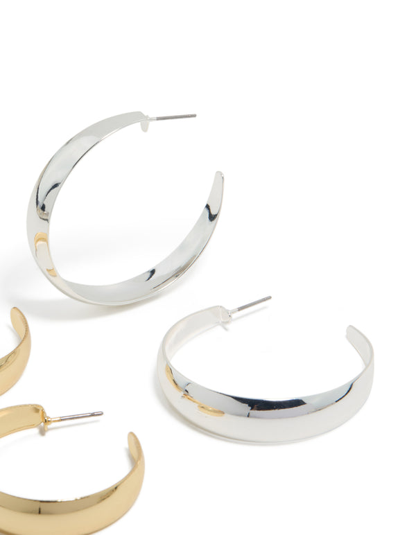 Showcasing mixed metal plated thick and skinny hoop earrings in a 2-pack with gold and silver tones, chunky styling and hoop closure post detail view
