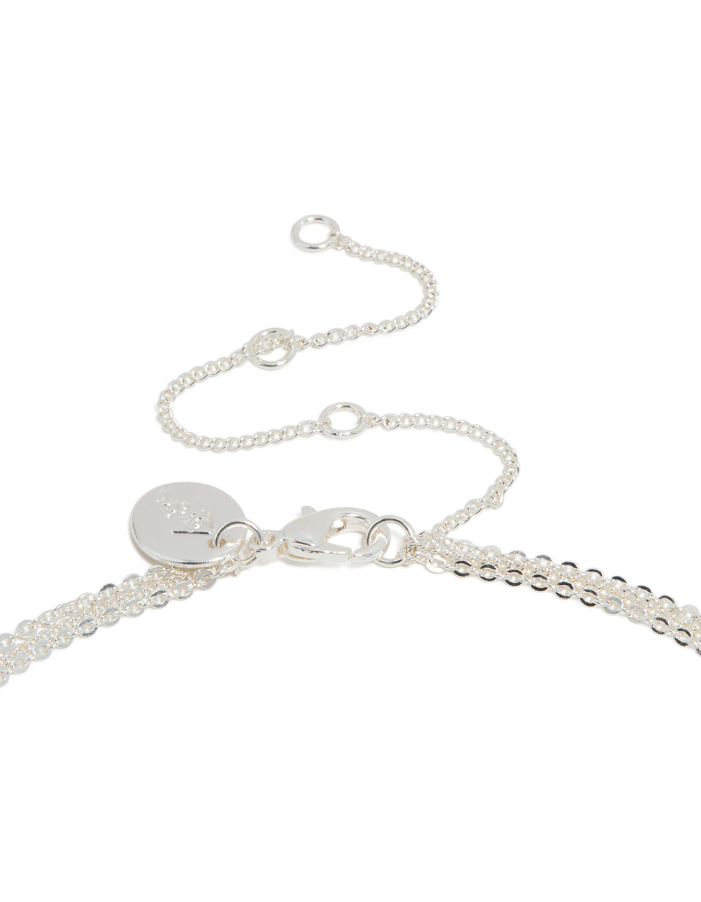 Showcasing silver plated bar and cross layered necklace with balls, beads designed in dainty style clasp detail view