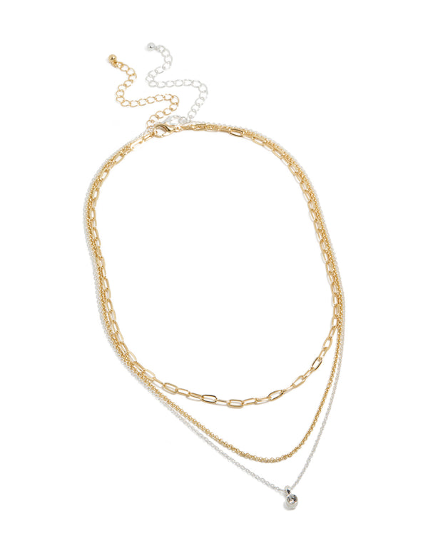 Featuring a mixed metal layered necklace with paperclip chain, diamante accents in gold and silver plated finish front view