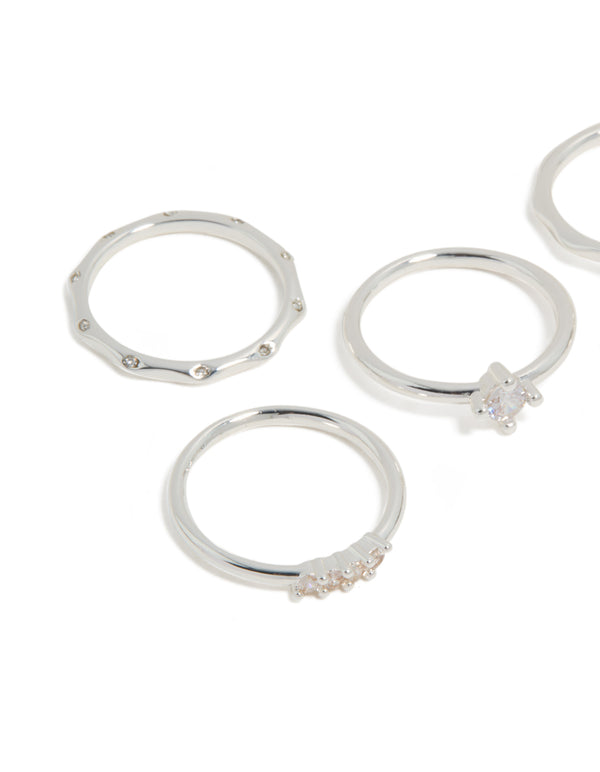 Showcasing silver plated wavy and cubic zirconia detail rings 5-pack with solitaire stone cut in crystal close up view
