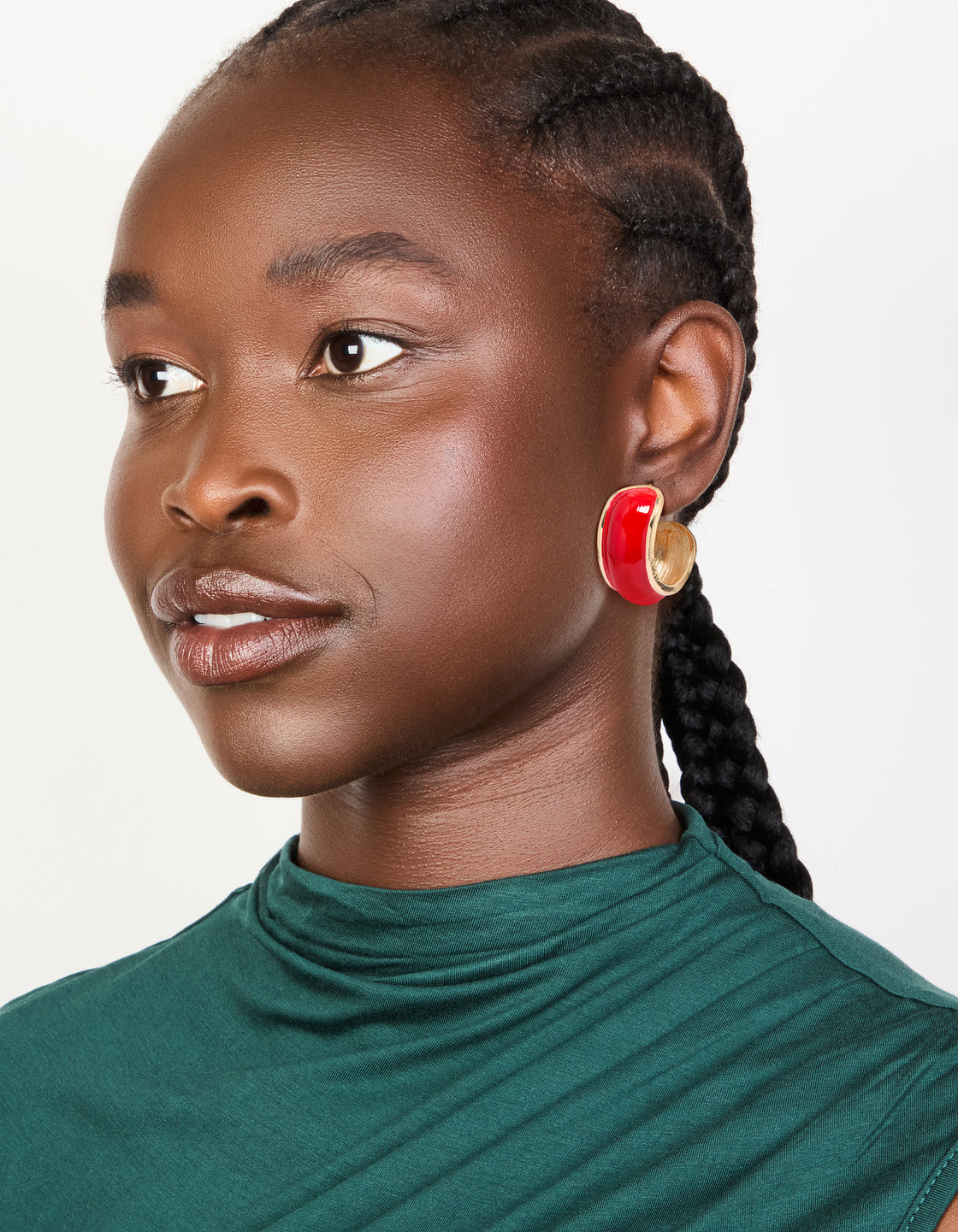 Featuring mini chunky statement hoop earrings in red and gold on model view