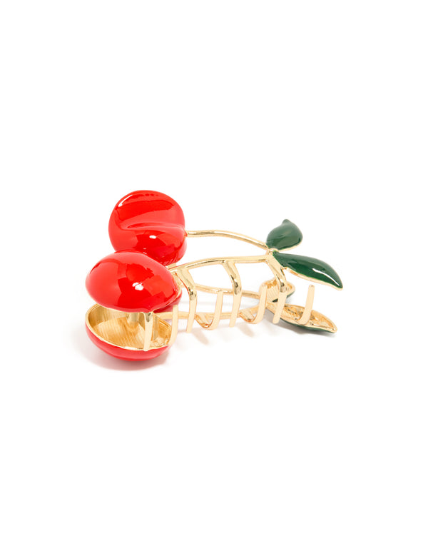 Discover this cherry claw clip with fruit and leaf accents in solid gold front view
