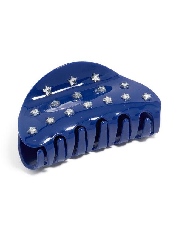 Showcasing a blue cutie star hair claw with celestial design in novelty print navy and silver front view