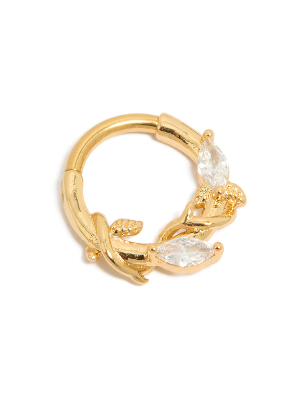 Showcasing a gold plated titanium clicker ring with leaf design and cubic zirconia stones front view
