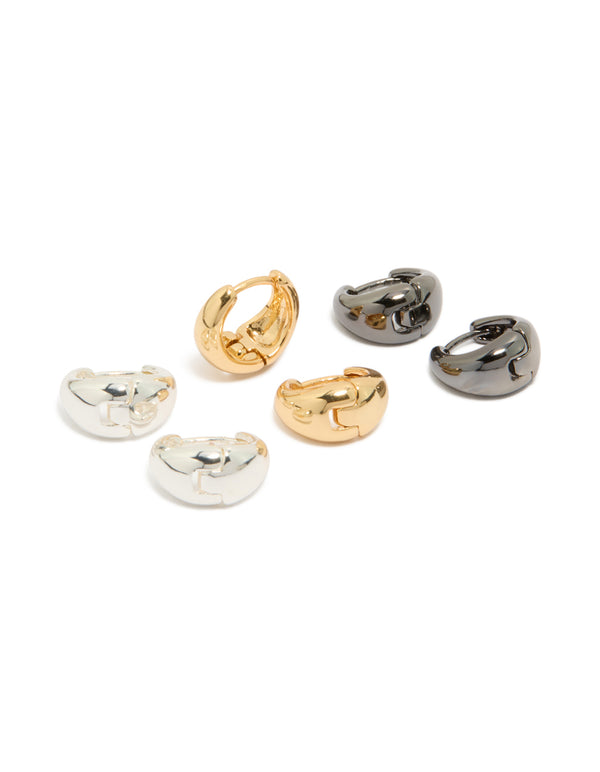 Showcasing mixed metal small graduated huggie earrings in a 3-pack with gold and silver plated finishes front view