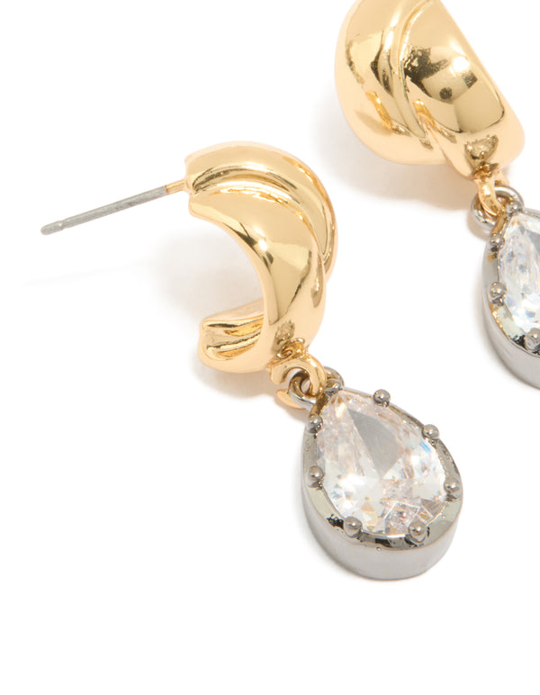 Featuring mixed metal plated cubic zirconia knot teardrop earrings highlighting stone setting and prong detail close up view
