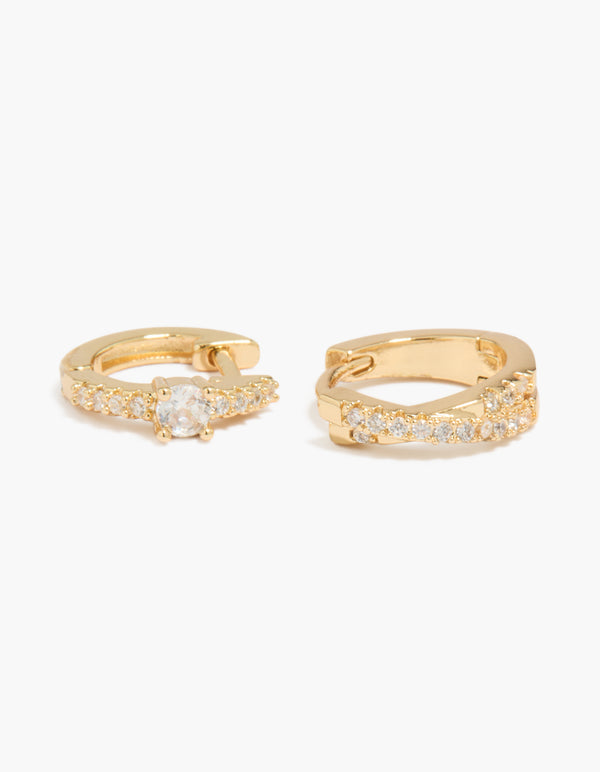 Designed with gold plated cubic zirconia and criss cross huggie earrings 2-pack in clear stone close up view