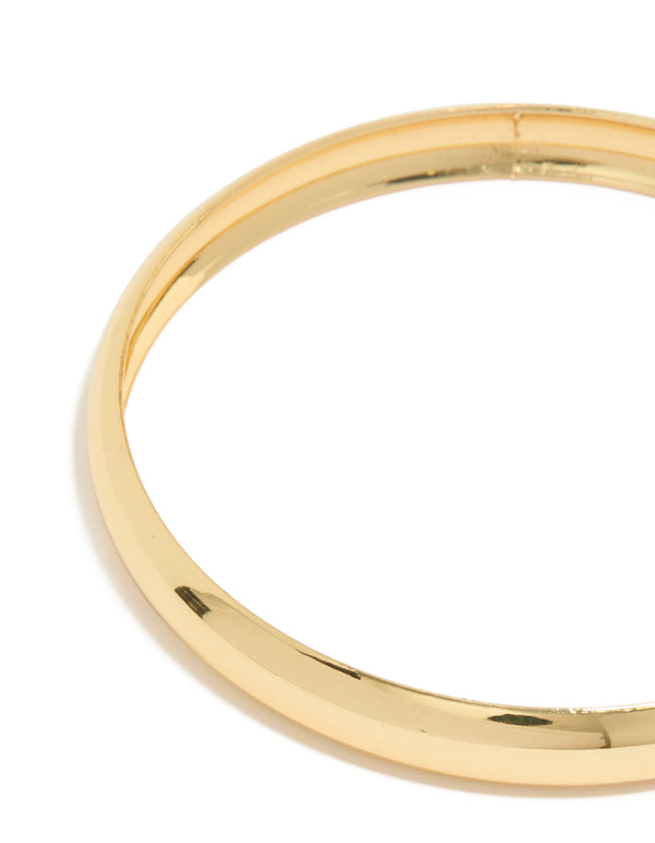 Discover this multi size bangle in a 3-pack crafted from gold plated material featuring a smooth polished surface close up view