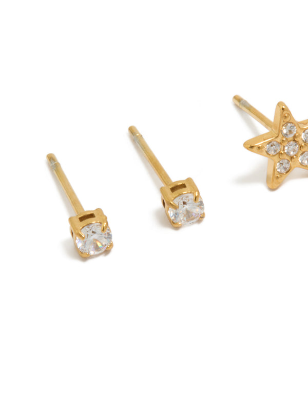 Charming kids surgical steel stud earrings with celestial star designs and cubic zirconia in gold, 2-pack close up view