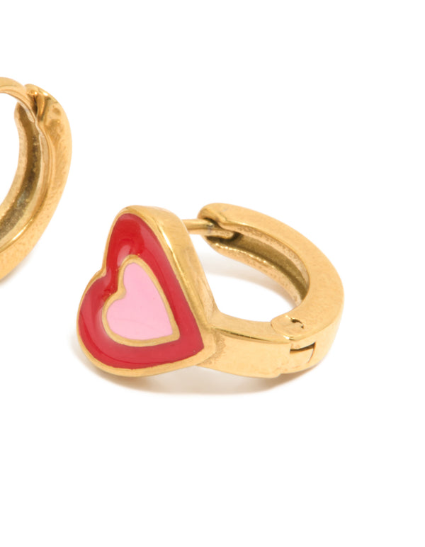 Featuring kids gold plated surgical steel heart sleeper earrings in crimson and pink post detail view