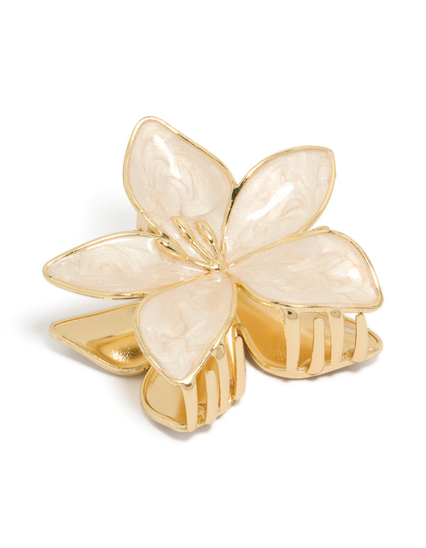 Featuring a floral enamel tropical stem hair claw clip in gold and cream front view