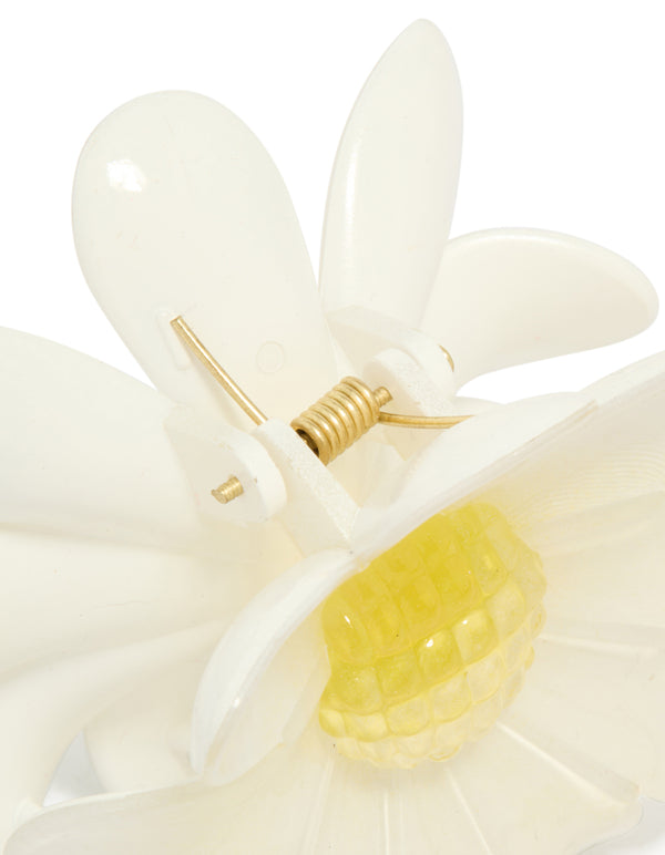 Crafted with a glossy daisy flower claw clip featuring in ivory, yellow detail view