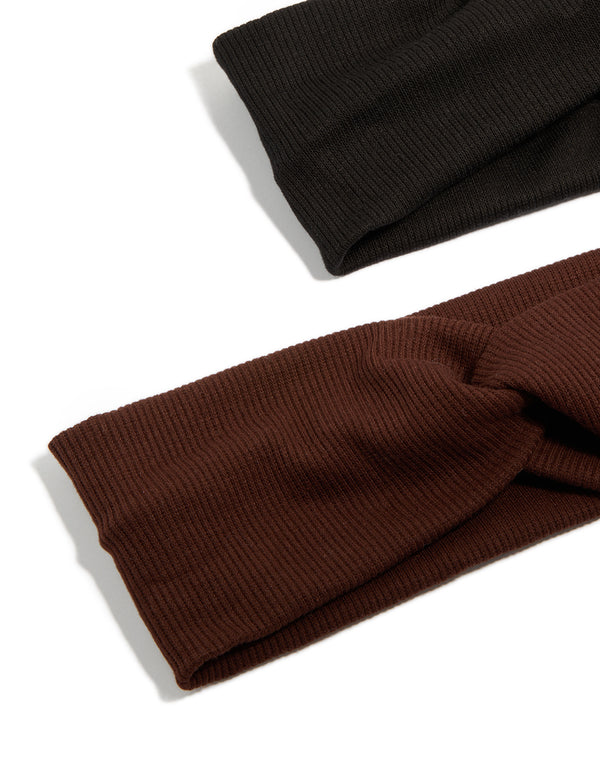 Crafted from solid ribbed slim stretch material, these chocolate brown and black headbands come in a 2-pack detail view