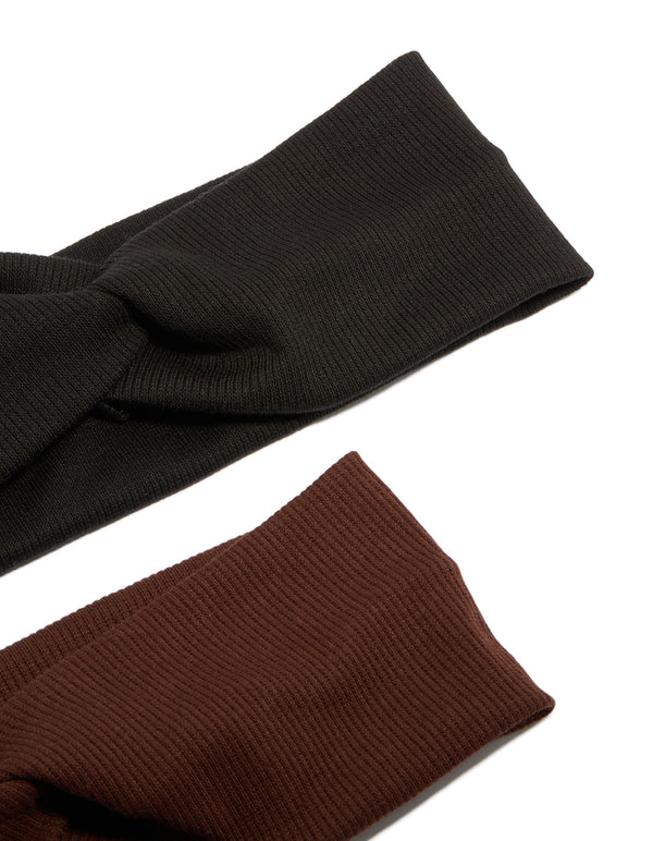Crafted from solid ribbed slim stretch material, these chocolate brown and black headbands come in a 2-pack detail view