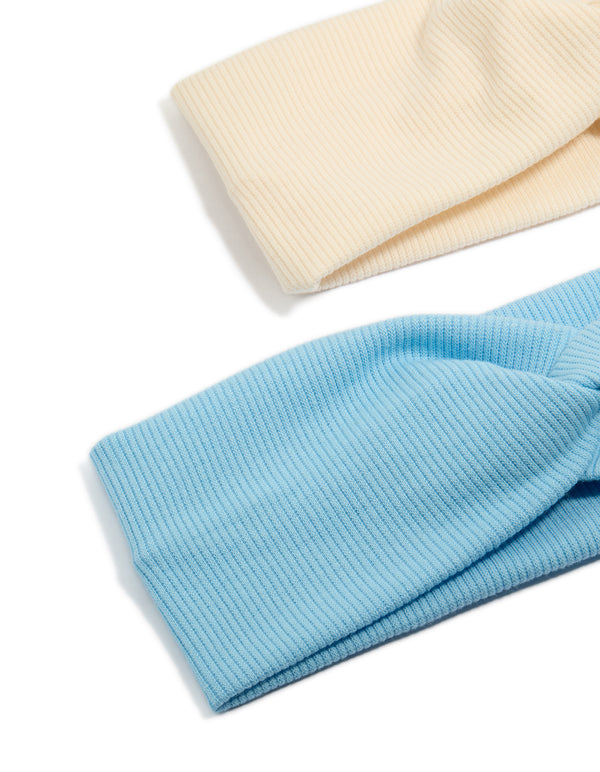 Crafted from ribbed twisted fabric, these stretch headbands 2-pack with solid print in sky blue and beige detail view