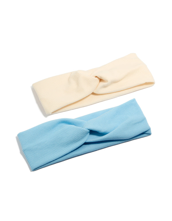 Discover this ribbed twisted fabric stretch headbands 2-pack featuring solid print in sky blue and beige front view