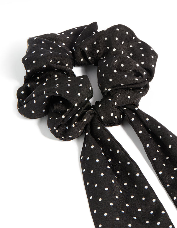 Featuring a polkadot fabric micro spot long scarf in black and white side view