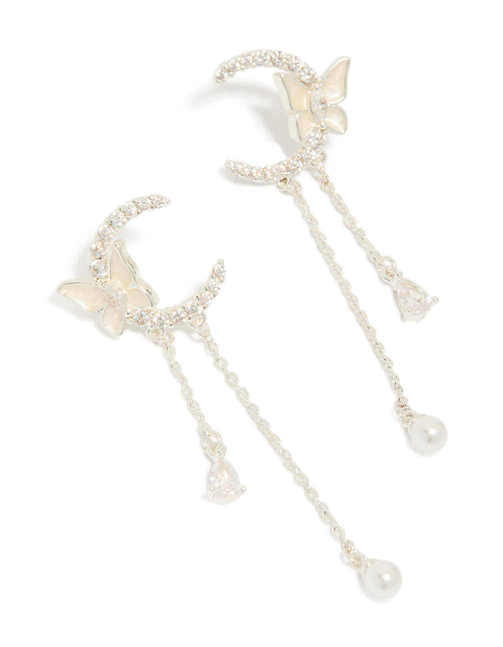 Showcasing silver plated cubic zirconia moon and butterfly drop earrings featuring celestial charm with pearl accents front view