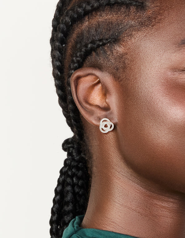 Featuring silver plated cubic zirconia Milky Way earrings on ear view