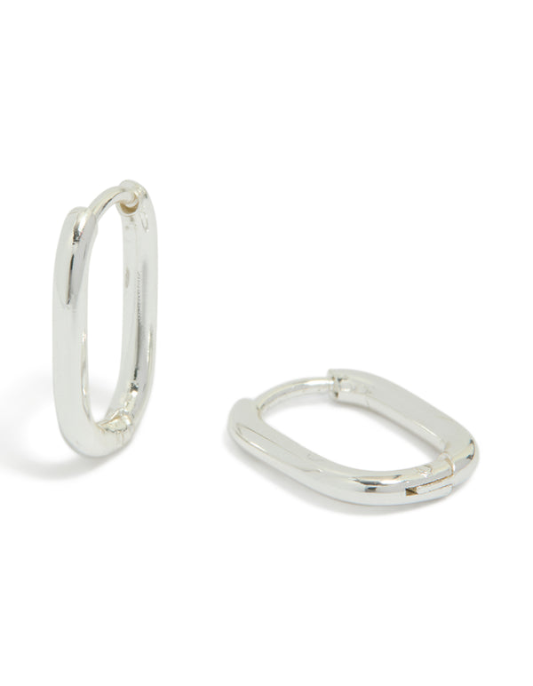 Showcasing waterproof silver plated stainless steel rectangle huggie earrings with huggie closure in silver front view