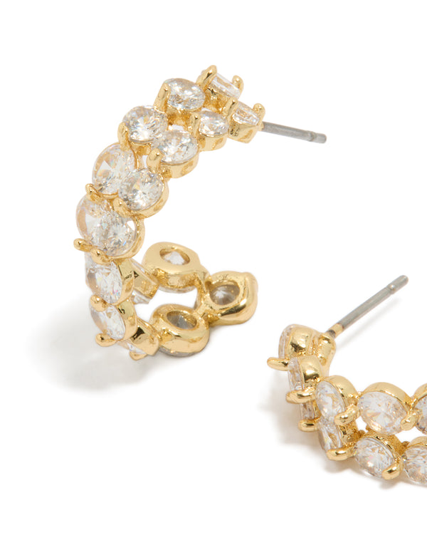 Featuring gold plated cubic zirconia double layered small hoop earrings with detailed close up view