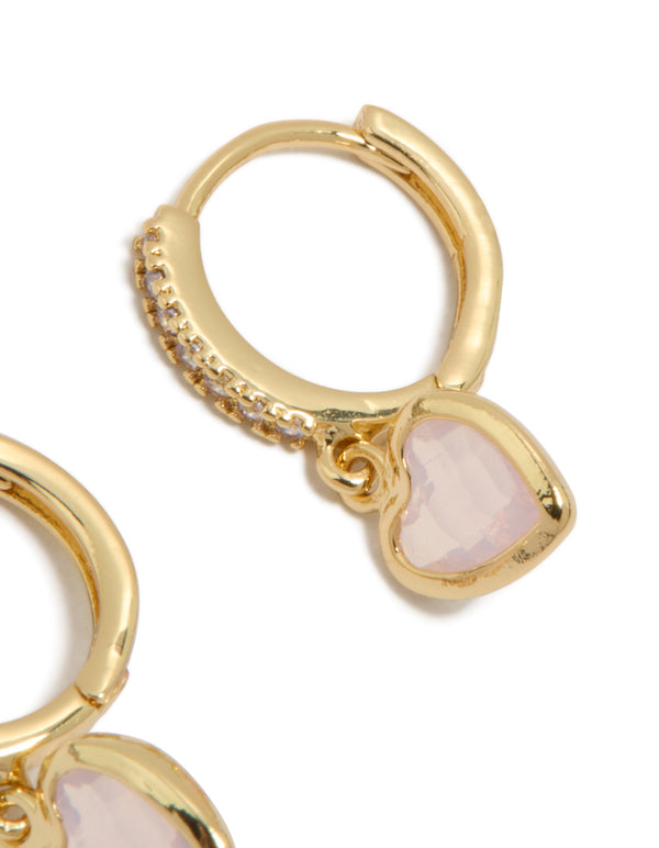 Featuring dainty gold plated cubic zirconia and pink heart drop huggie closure earrings post detail view