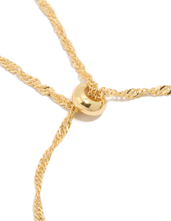 A gold plated double helix toggle bracelet highlighting adjustable closure detail view