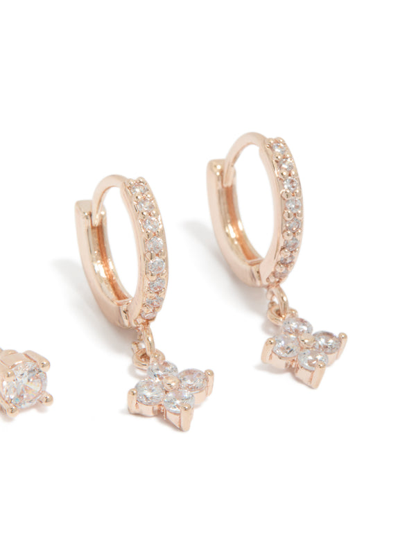 Crafted from rose gold plated cubic zirconia studs with dainty floral and crystal accents in 2-pack close up view