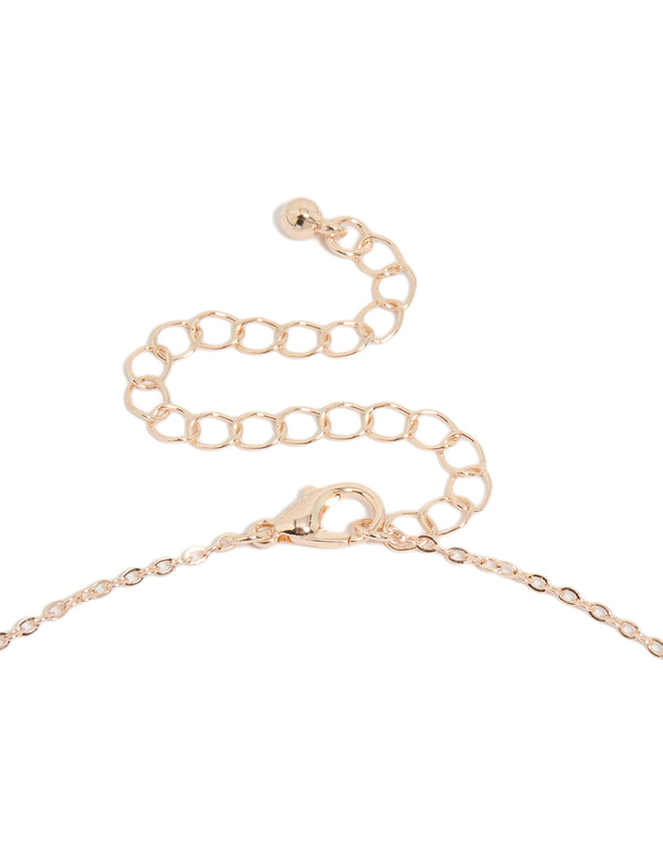 Charming floral pendant necklace featuring diamante with pink outline, rose gold plated material and cubic zirconia clasp detail view