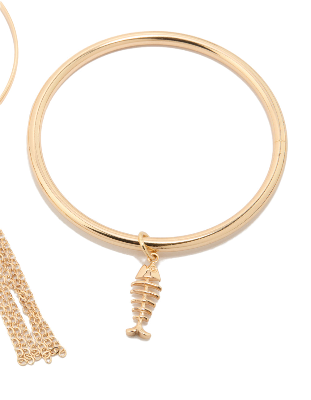 Crafted from gold with charm and tassel details, these bangles in a 3-pack feature shell and ocean-inspired accents closure detail view