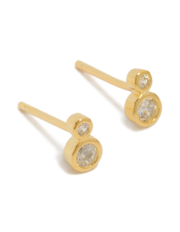 Featuring dainty stud earrings crafted from gold plated sterling silver with cubic zirconia in a double bezel setting front view