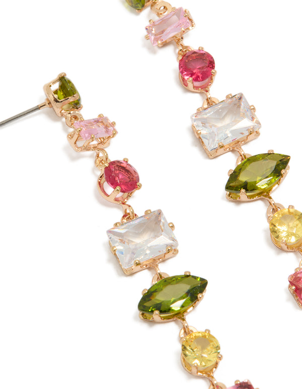 Featuring statement drop earrings with mismatched colourful cubic zirconia stones in gold and pink, olive, yellow tones close up view