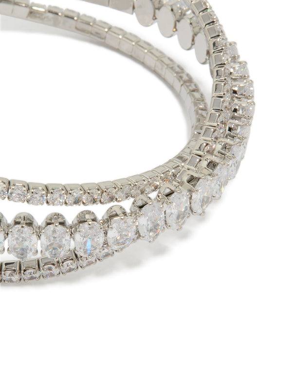 Elegant statement crossover wrist cuff crafted from cubic zirconia in silver close up view