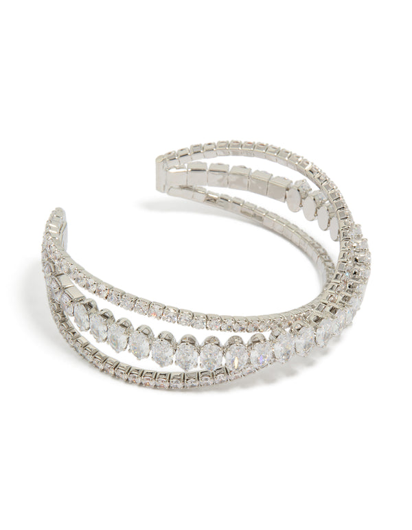 Discover a statement crossover wrist cuff featuring cubic zirconia in silver front view