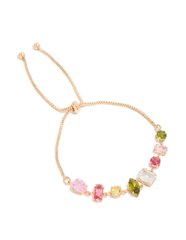 Beautifully designed gold pink and green mismatched cubic zirconia toggle bracelet featuring multicolored accents front view