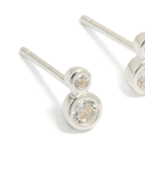Beautiful double bezel set stud earrings featuring cubic zirconia in sterling silver close up view