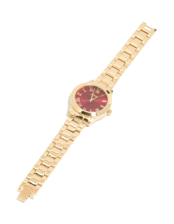 Classic women's analog timepiece featuring brown roman numeral dial, round shape, link band strap in gold for formal occasions view