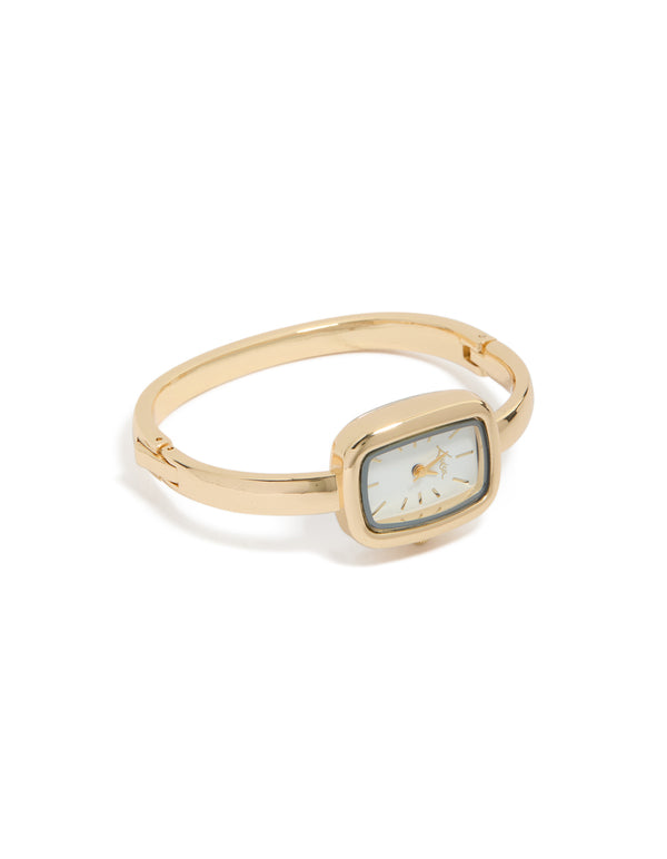 Elegant women's analog bangle watch in gold with white dial and rectangle shape, designed with link-band strap for formal occasions, front view