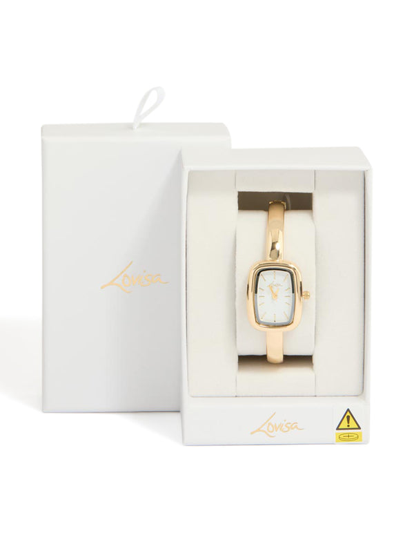 Women's analog bangle watch featuring white dial and rectangle shape, crafted with link-band in gold strap color for formal occasion wear, case detail view